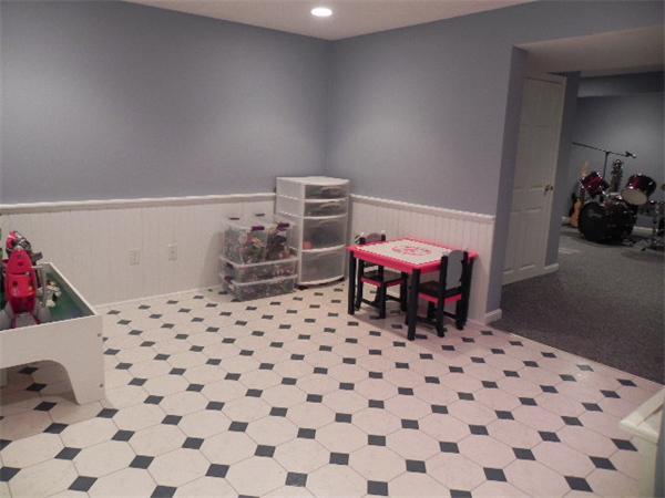 85 Culloden Drive Canton, MA 02021 - Photo 18 of 23 a room with furniture a rug and a potted plant