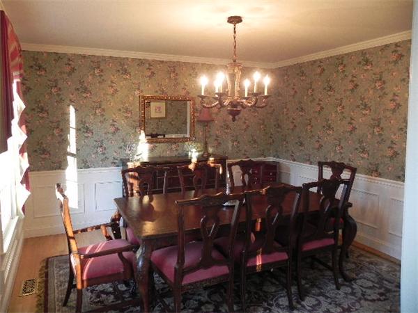 85 Culloden Drive Canton, MA 02021 - Photo 7 of 23 a view of a dining room with furniture and chandelier