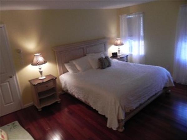 85 Culloden Drive Canton, MA 02021 - Photo 10 of 23 a bedroom with a bed and a lamp