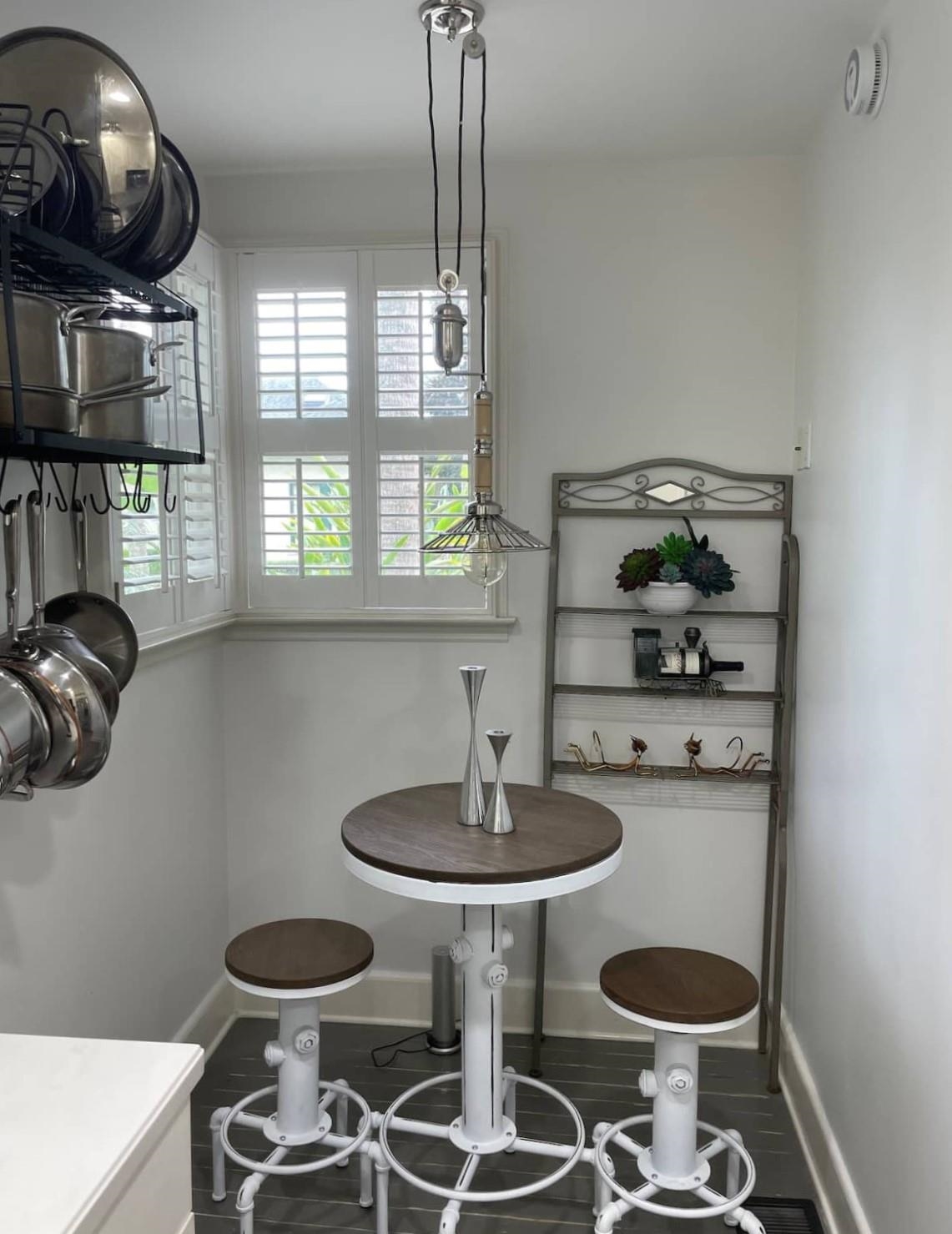 8 Tremerton Street St. Augustine, FL 32084 - Photo 16 of 41 a kitchen with a stove and a table