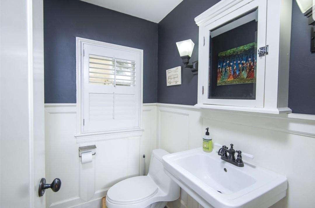 8 Tremerton Street St. Augustine, FL 32084 - Photo 19 of 41 a bathroom with a sink and a mirror