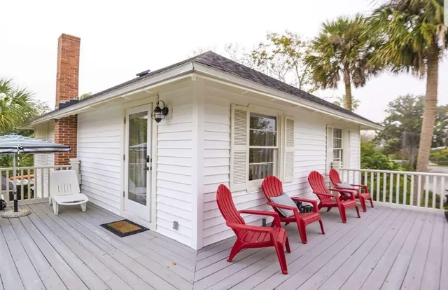 a view of a chairs and table on the wooden floor