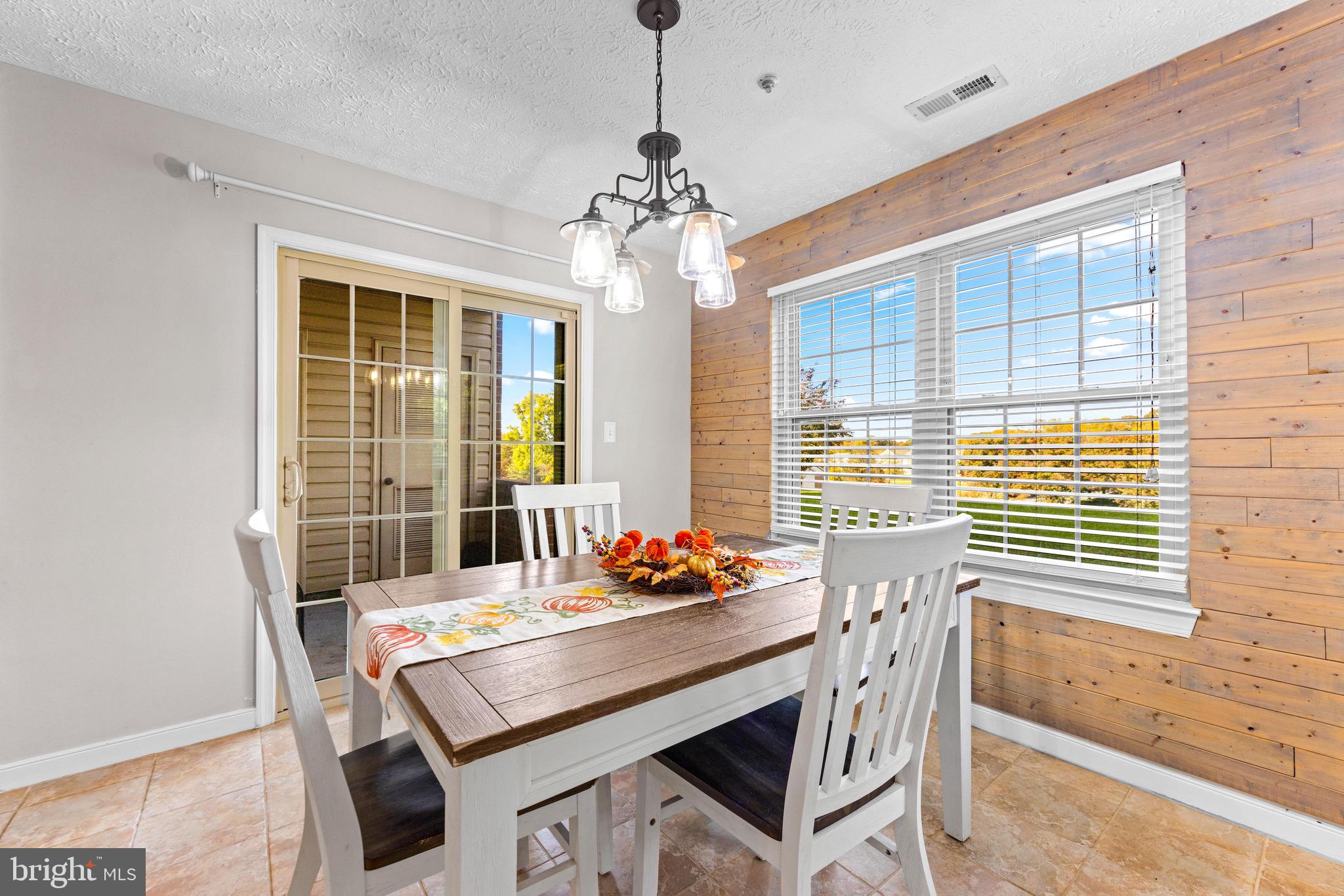 1713 Landmark Drive, Unit 1L Forest Hill, MD 21050 - Photo 14 of 28 a dining room with furniture and window