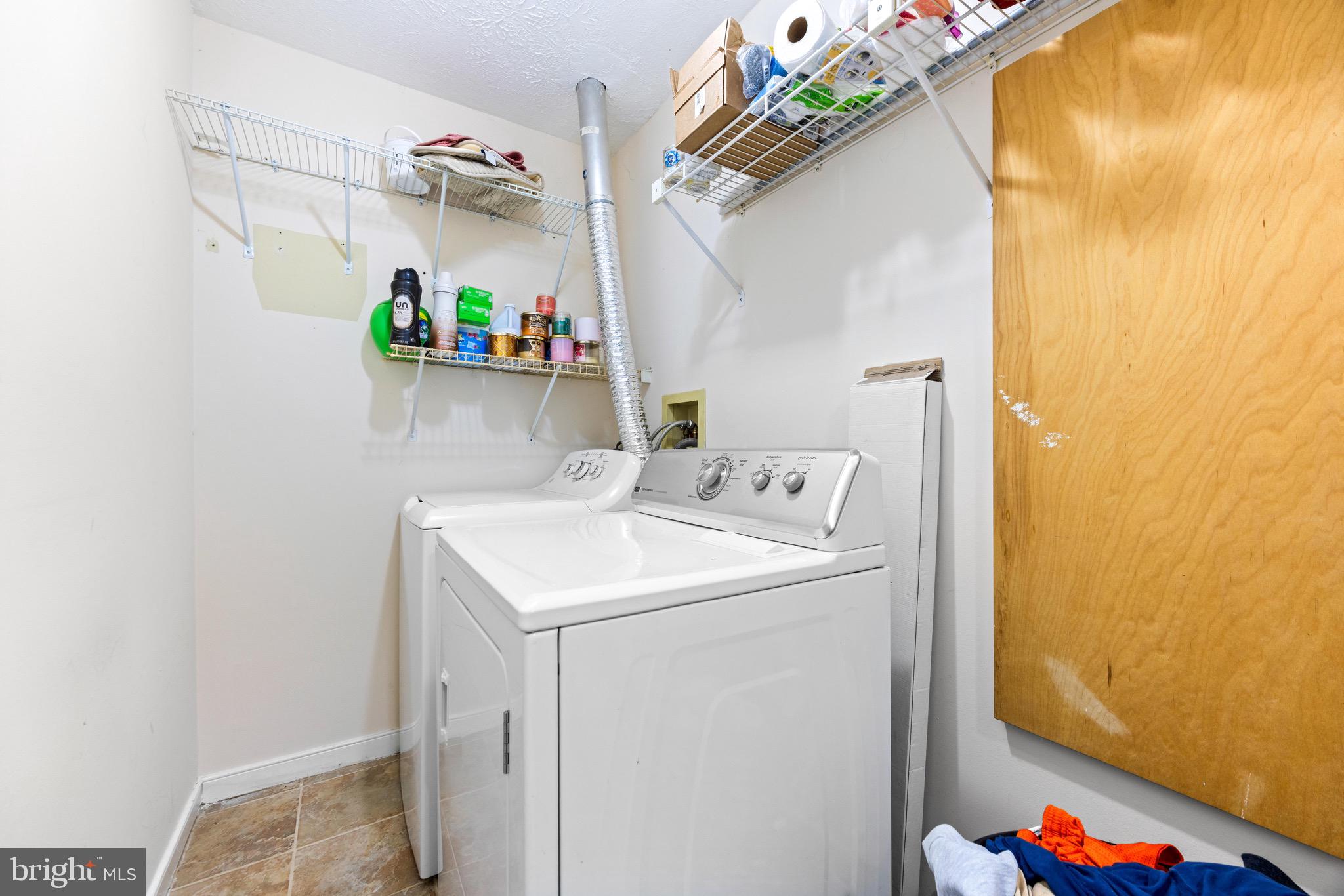 1713 Landmark Drive, Unit 1L Forest Hill, MD 21050 - Photo 23 of 28 a utility room with dryer and washer