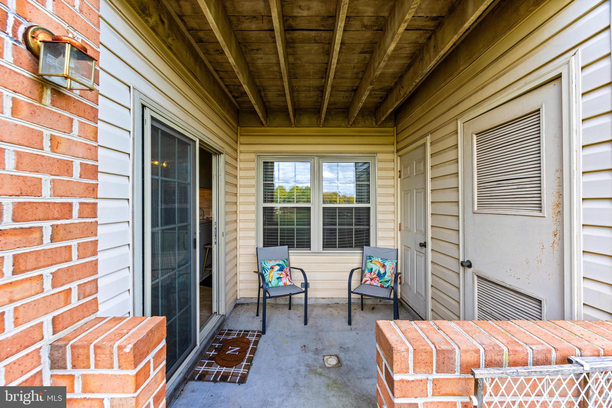 1713 Landmark Drive, Unit 1L Forest Hill, MD 21050 - Photo 26 of 28 a bedroom with furniture and a large window