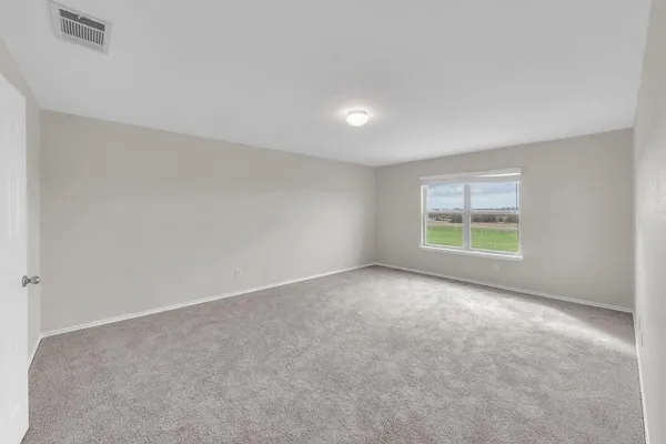an empty room with a window