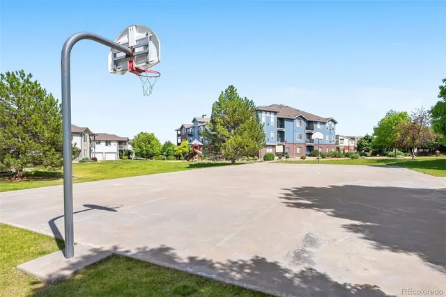 a view of a street with a building in the background