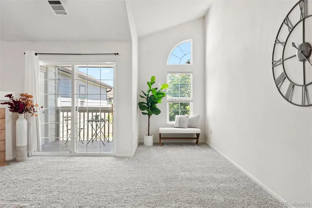a view of entryway with wooden floor