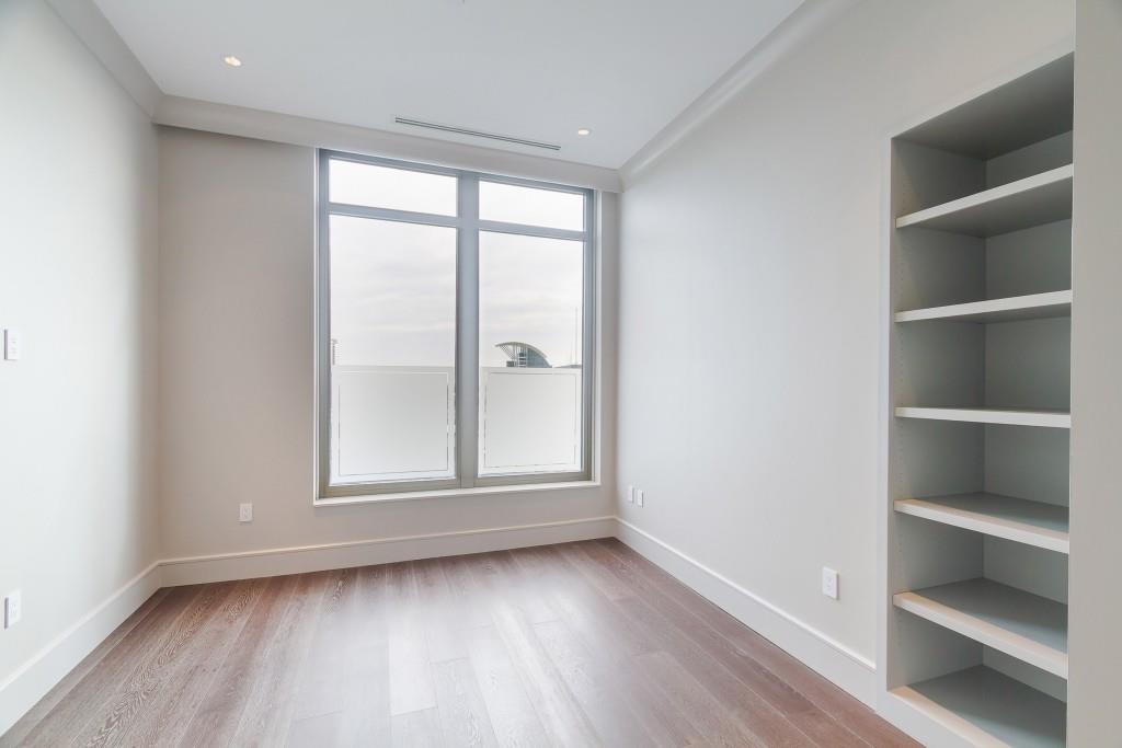 3376 Peachtree Road Northeast, Unit 33A Atlanta, GA 30326 - Photo 26 of 49 a view of an empty room with a window and wooden floor