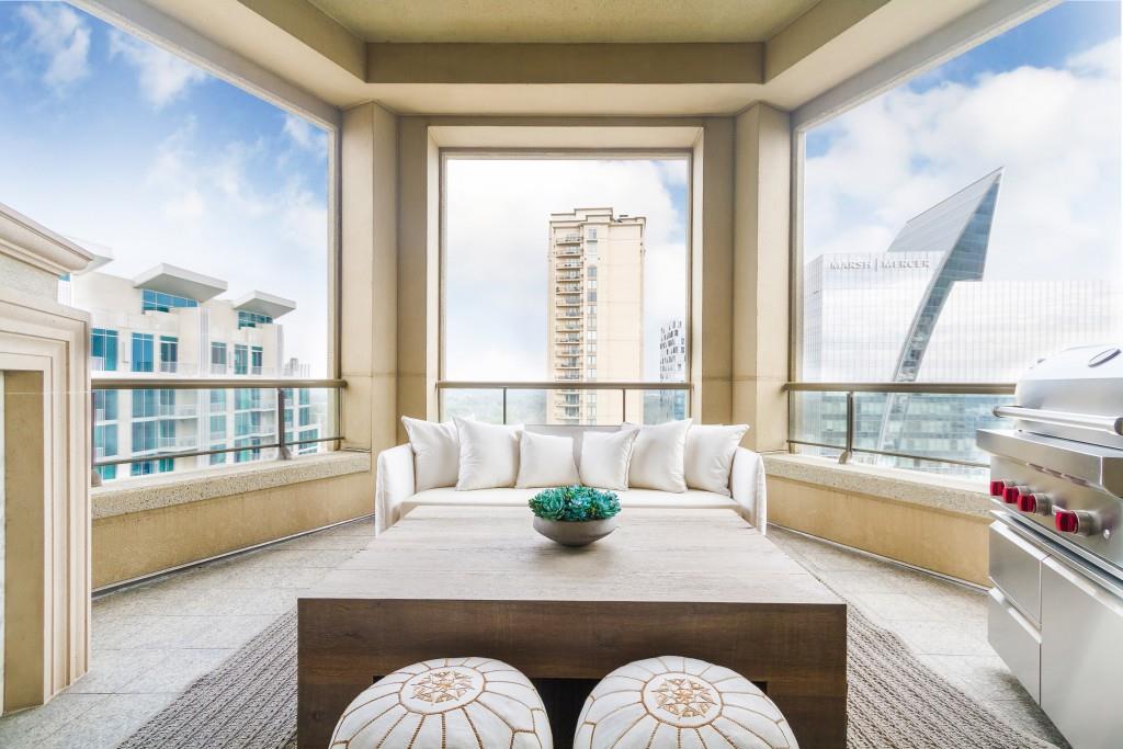 3376 Peachtree Road Northeast, Unit 33A Atlanta, GA 30326 - Photo 29 of 49 a living room with furniture and a potted plant