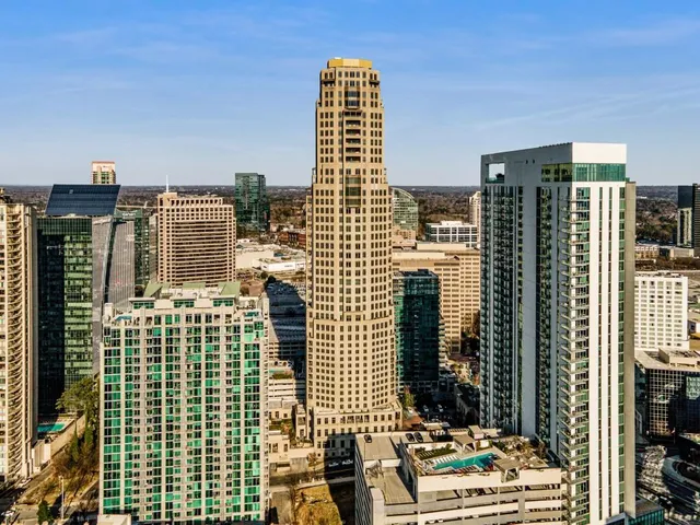 a view of a city with tall buildings