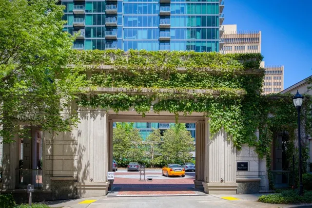 a view of a building and trees around