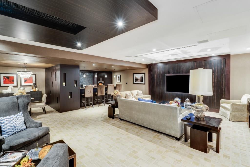 3376 Peachtree Road Northeast, Unit 33A Atlanta, GA 30326 - Photo 43 of 49 a living room with furniture and a flat screen tv