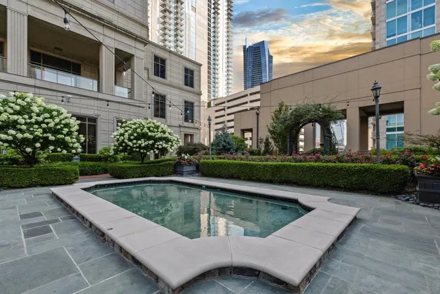 a view of a house with swimming pool