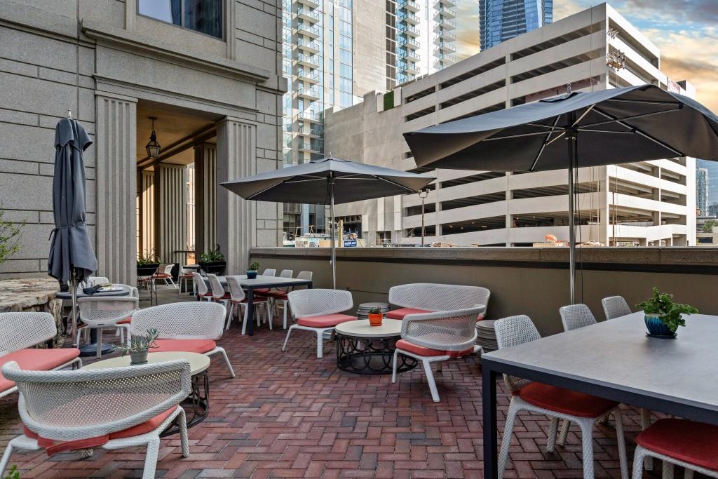 3376 Peachtree Road Northeast, Unit 33A Atlanta, GA 30326 - Photo 47 of 49 a couple of chairs sitting in front of a building
