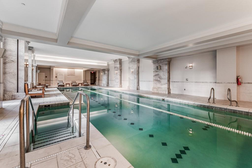 3376 Peachtree Road Northeast, Unit 33A Atlanta, GA 30326 - Photo 48 of 49 a bathroom with a sink double vanity and a mirror