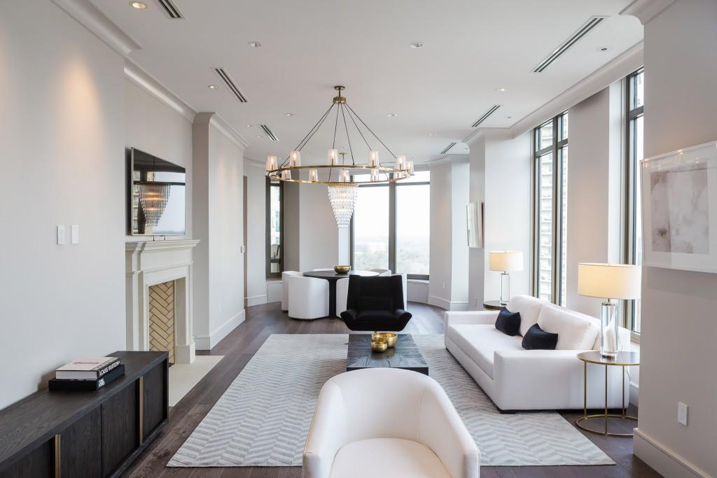 3376 Peachtree Road Northeast, Unit 33A Atlanta, GA 30326 - Photo 9 of 49 a living room with furniture and a flat screen tv
