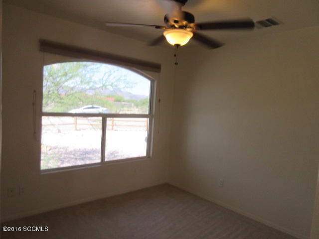 1881 Via Ochoa Rio Rico, AZ 85648 - Photo 35 of 44 an empty room with a window