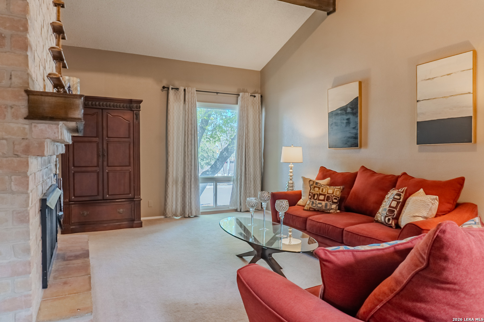 8942 Willmon Way Windcrest, TX 78239 - Photo 11 of 44 a living room with furniture and a fireplace