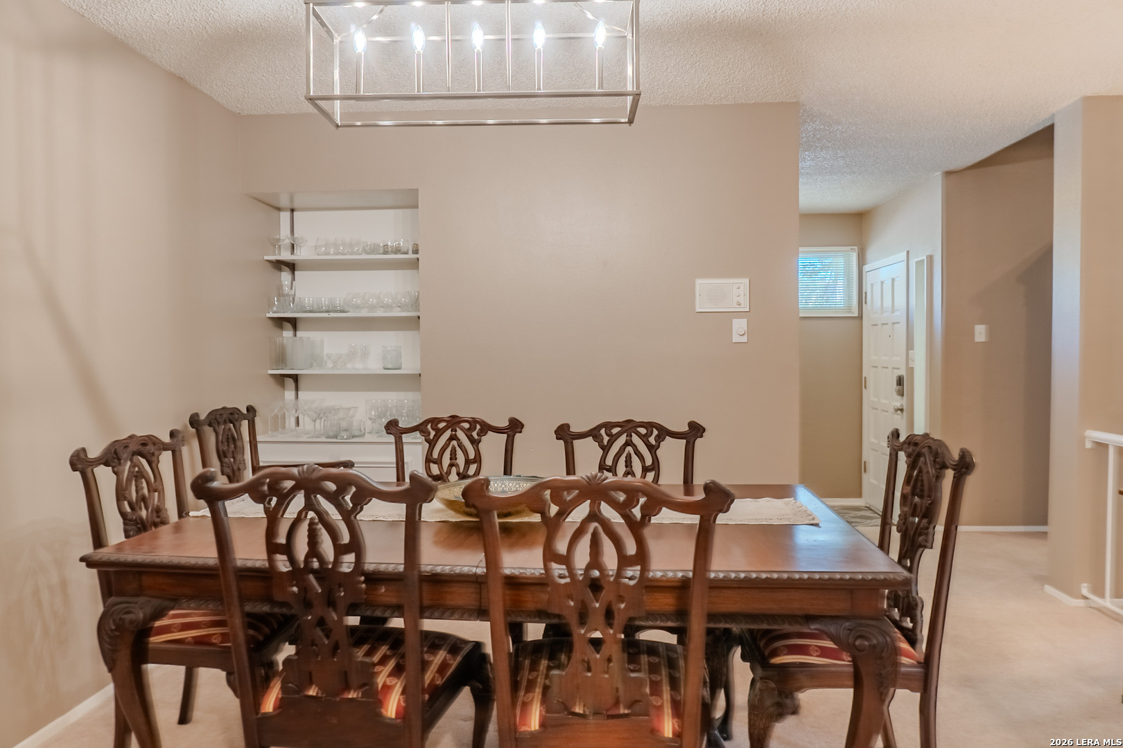 8942 Willmon Way Windcrest, TX 78239 - Photo 18 of 44 a view of a dining room with furniture