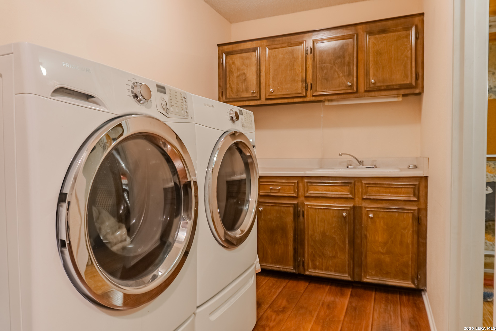8942 Willmon Way Windcrest, TX 78239 - Photo 40 of 44 a utility room with dryer and washer