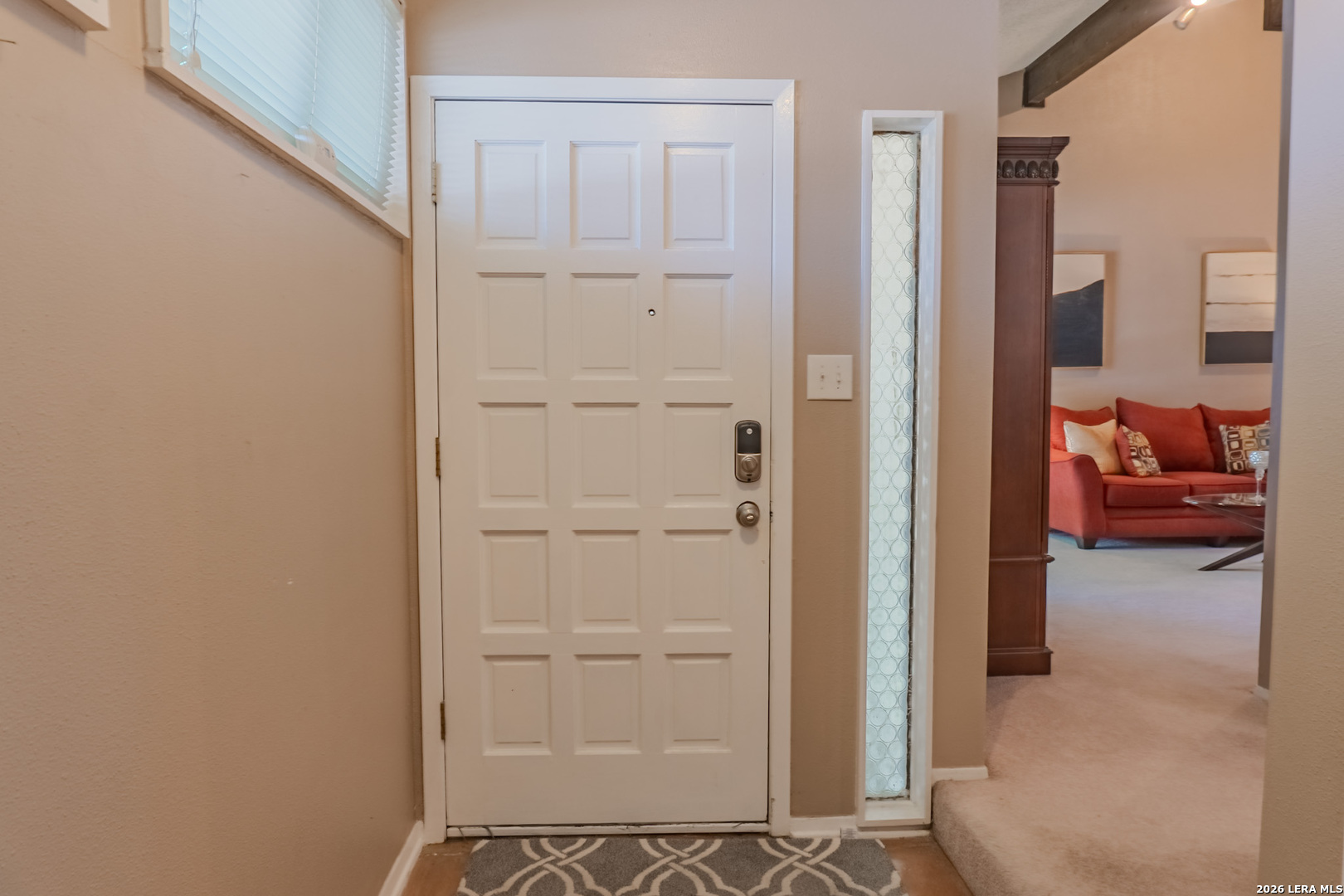 8942 Willmon Way Windcrest, TX 78239 - Photo 5 of 44 a view of hallway with livingroom and furniture