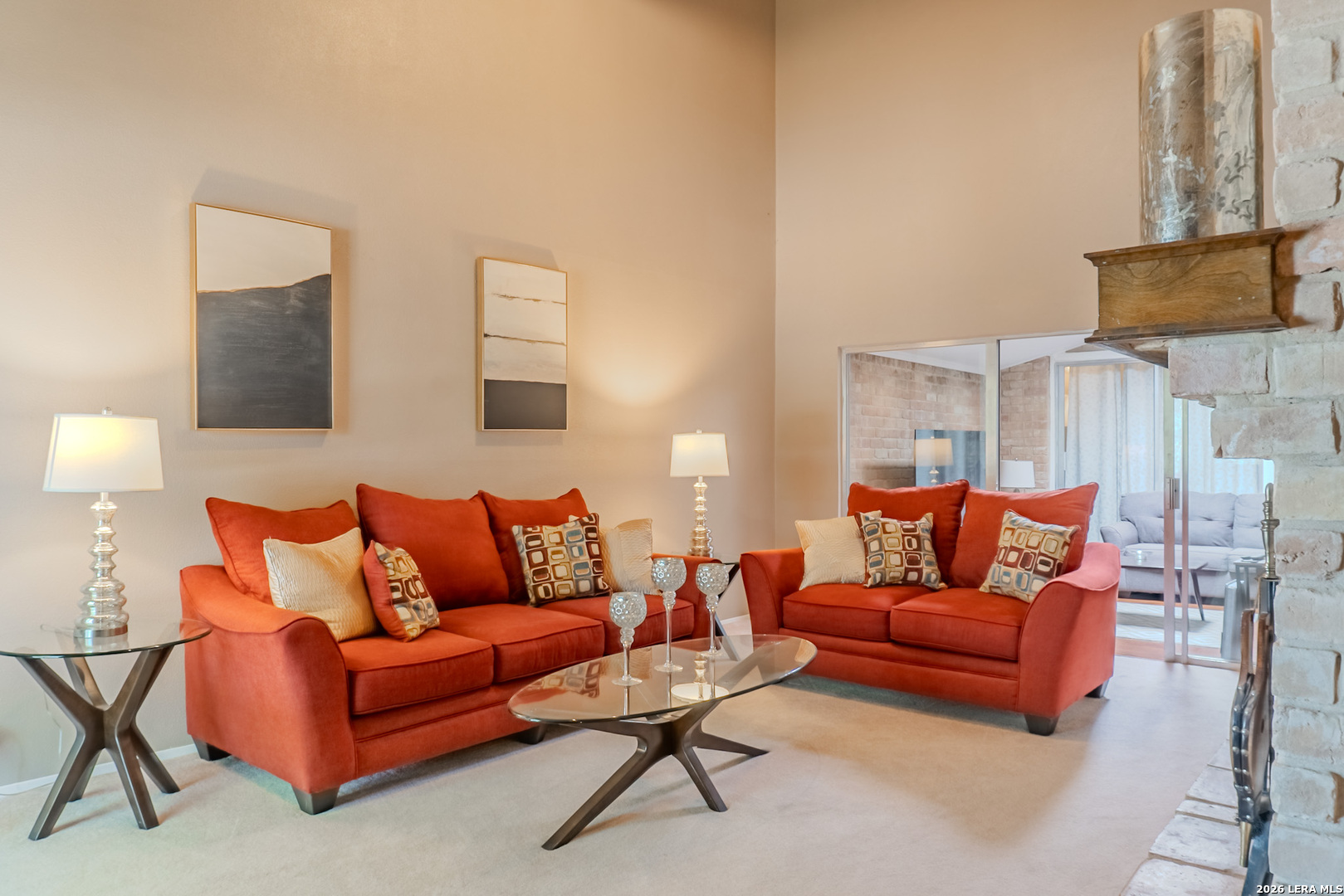 8942 Willmon Way Windcrest, TX 78239 - Photo 8 of 44 a living room with furniture and a lamp