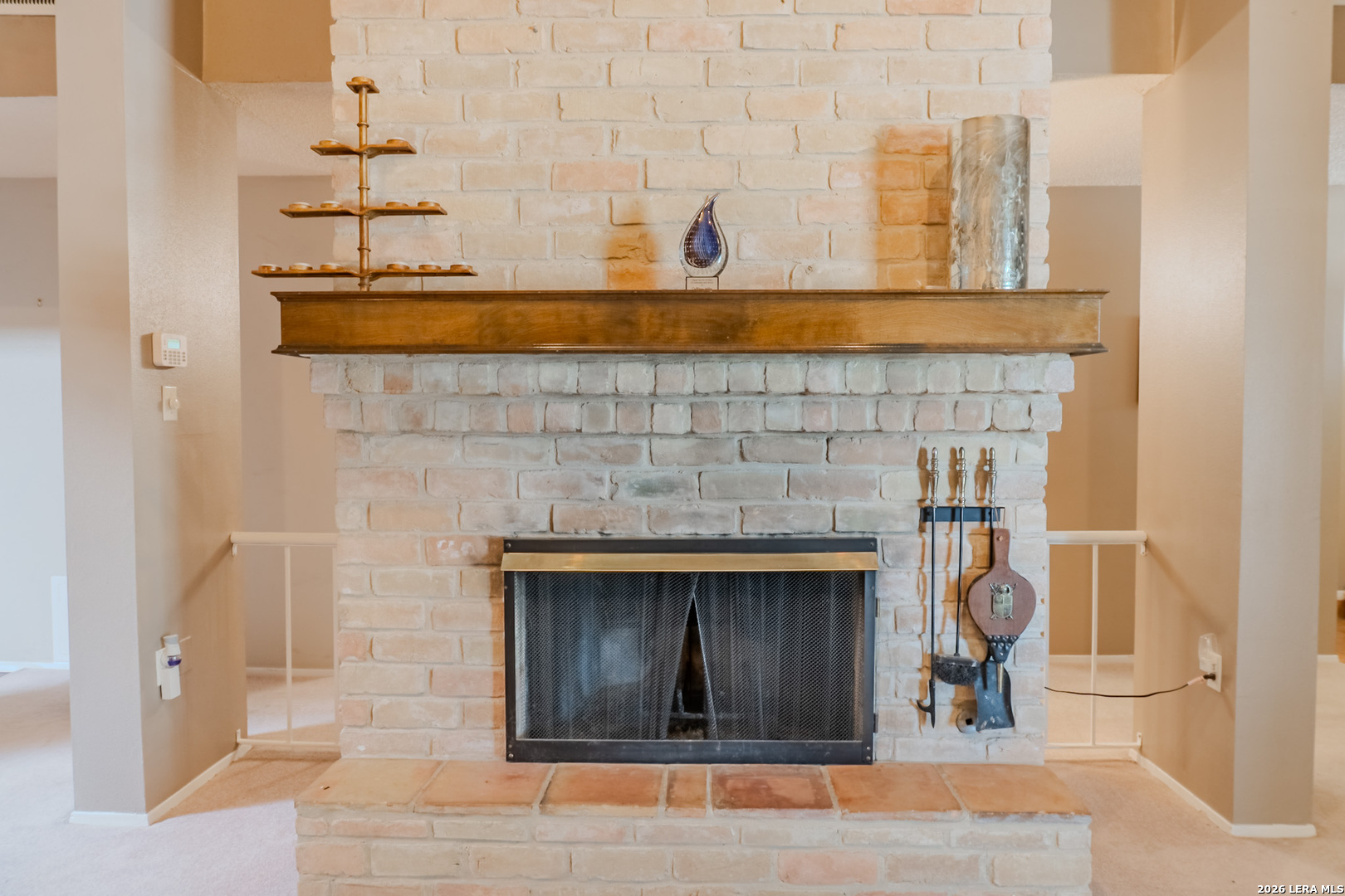 8942 Willmon Way Windcrest, TX 78239 - Photo 10 of 44 a front view of a fireplace