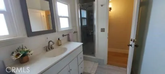 a view of a storage and utility room with washer and dryer
