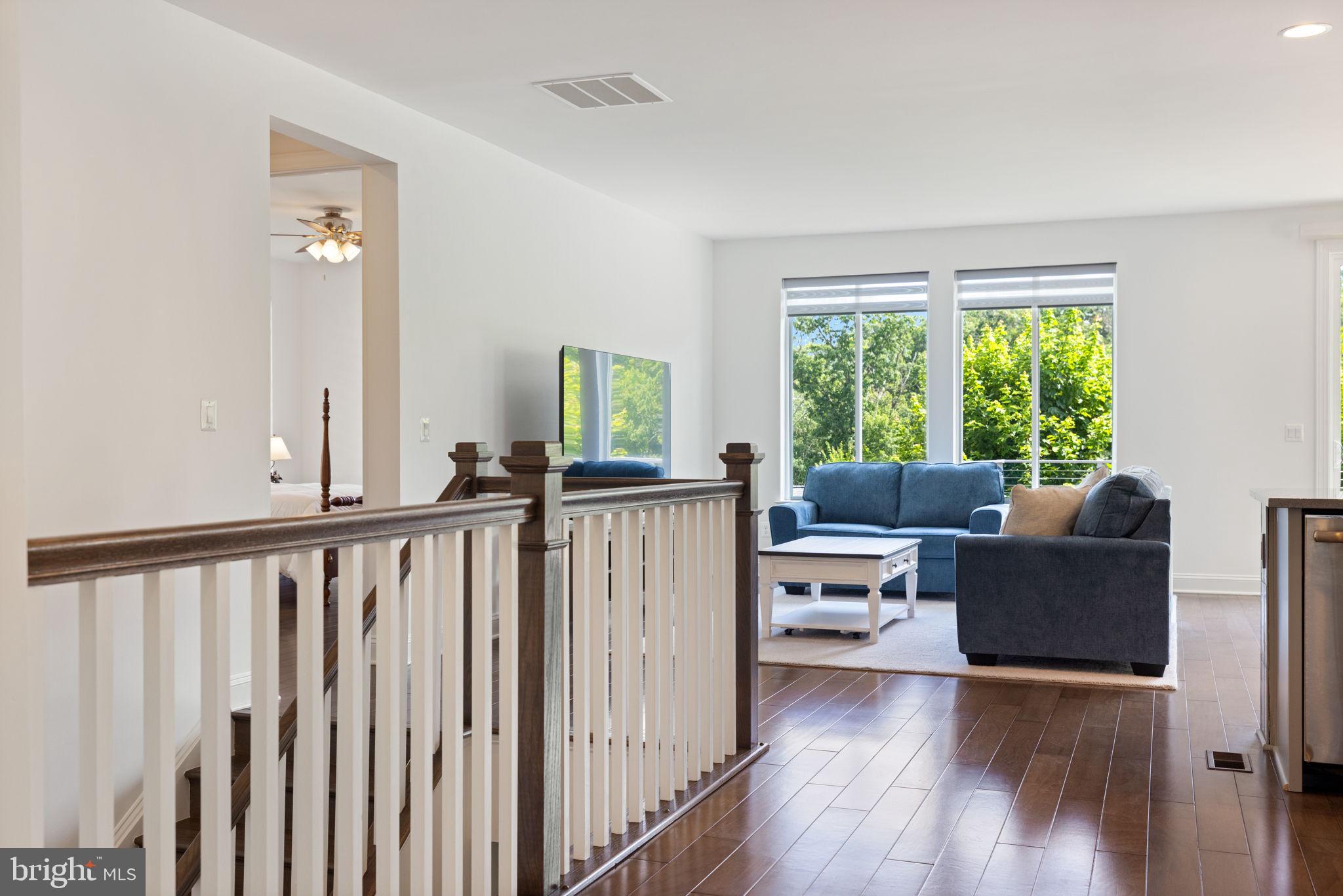 112 Flycatcher Way White Post, VA 22663 - Photo 13 of 59 a living room with furniture and a large window