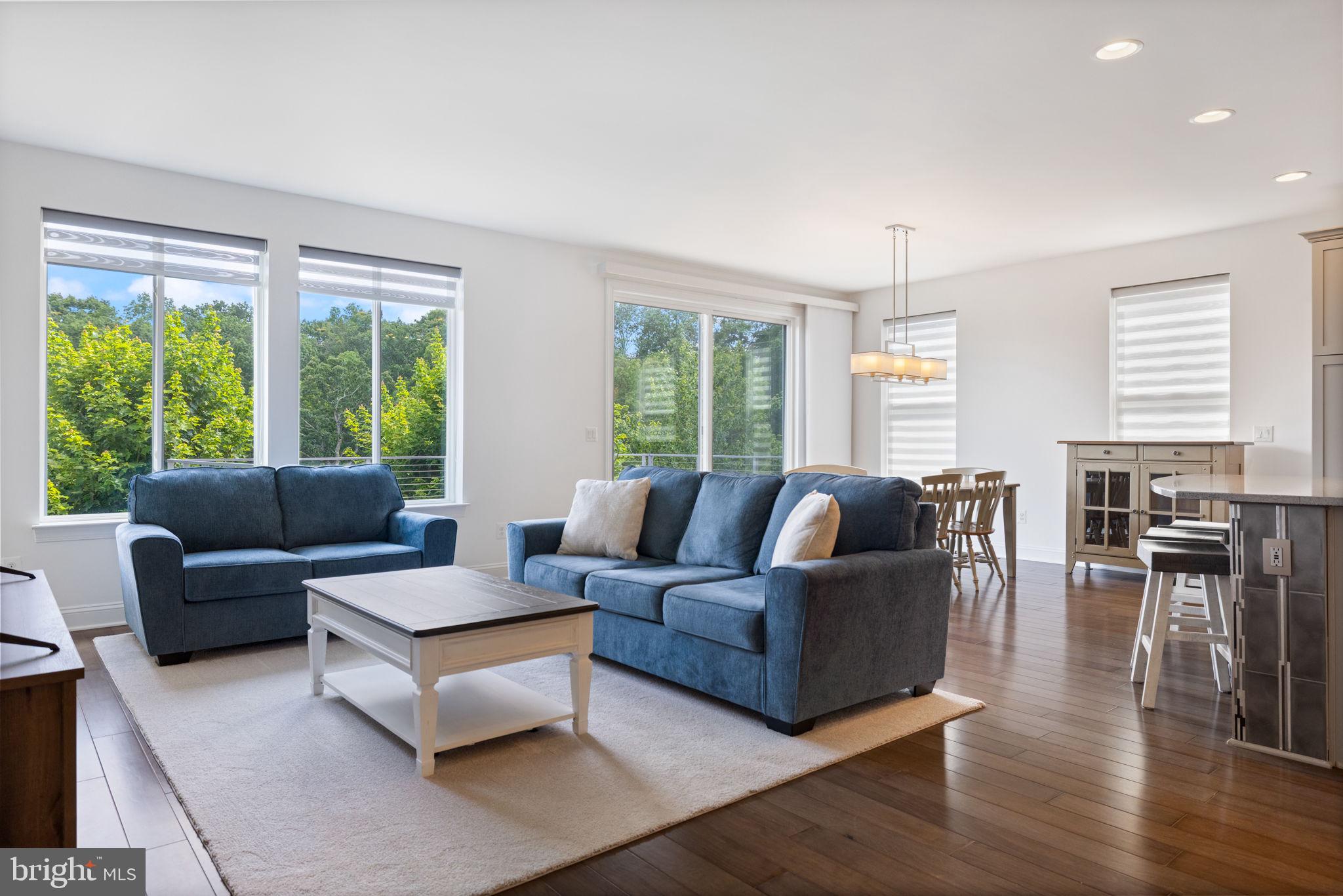112 Flycatcher Way White Post, VA 22663 - Photo 14 of 59 a living room with furniture and large windows