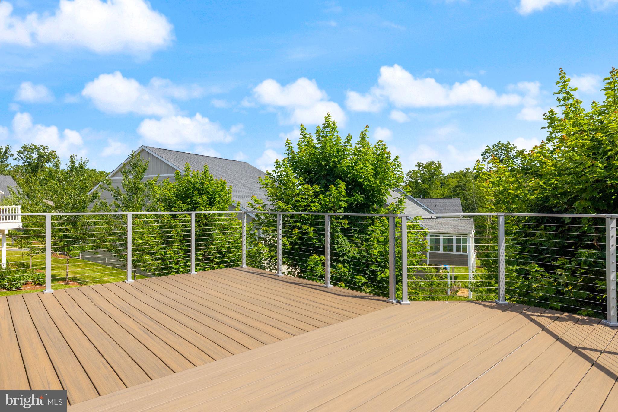 112 Flycatcher Way White Post, VA 22663 - Photo 21 of 59 a view of a balcony with wooden floor and fence