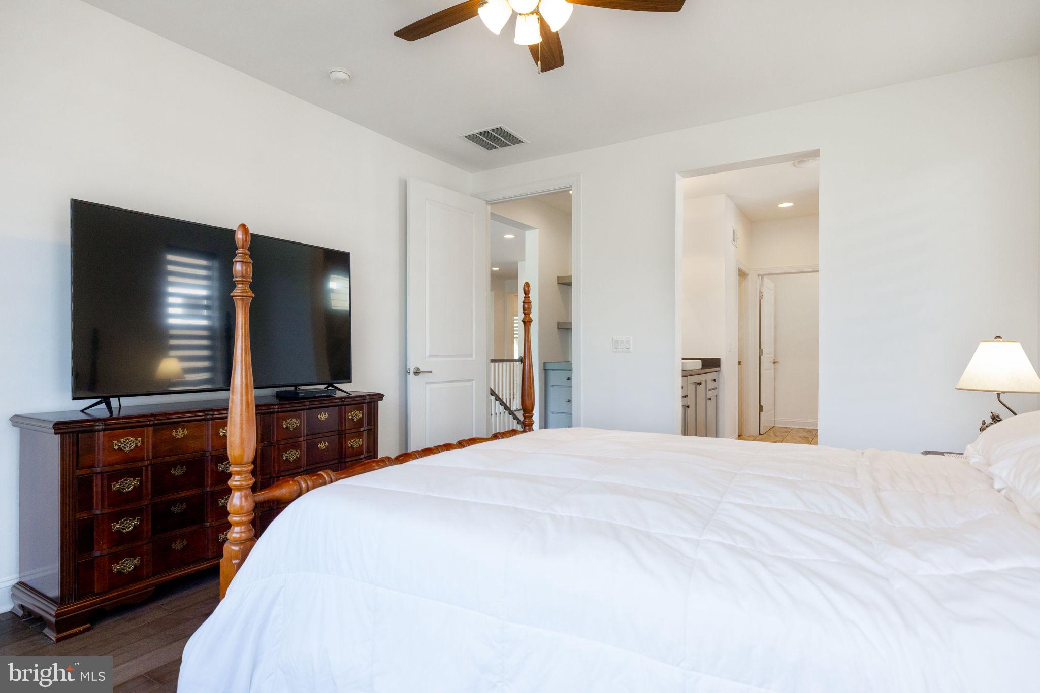 112 Flycatcher Way White Post, VA 22663 - Photo 23 of 59 a bedroom with a bed and a flat screen tv