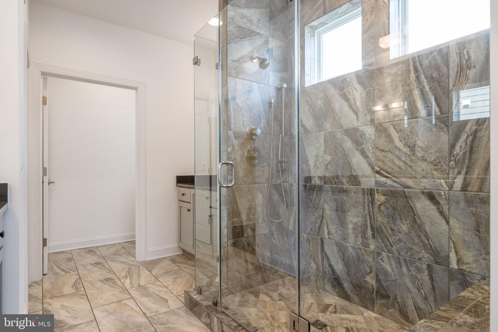 112 Flycatcher Way White Post, VA 22663 - Photo 26 of 59 a bathroom with a shower