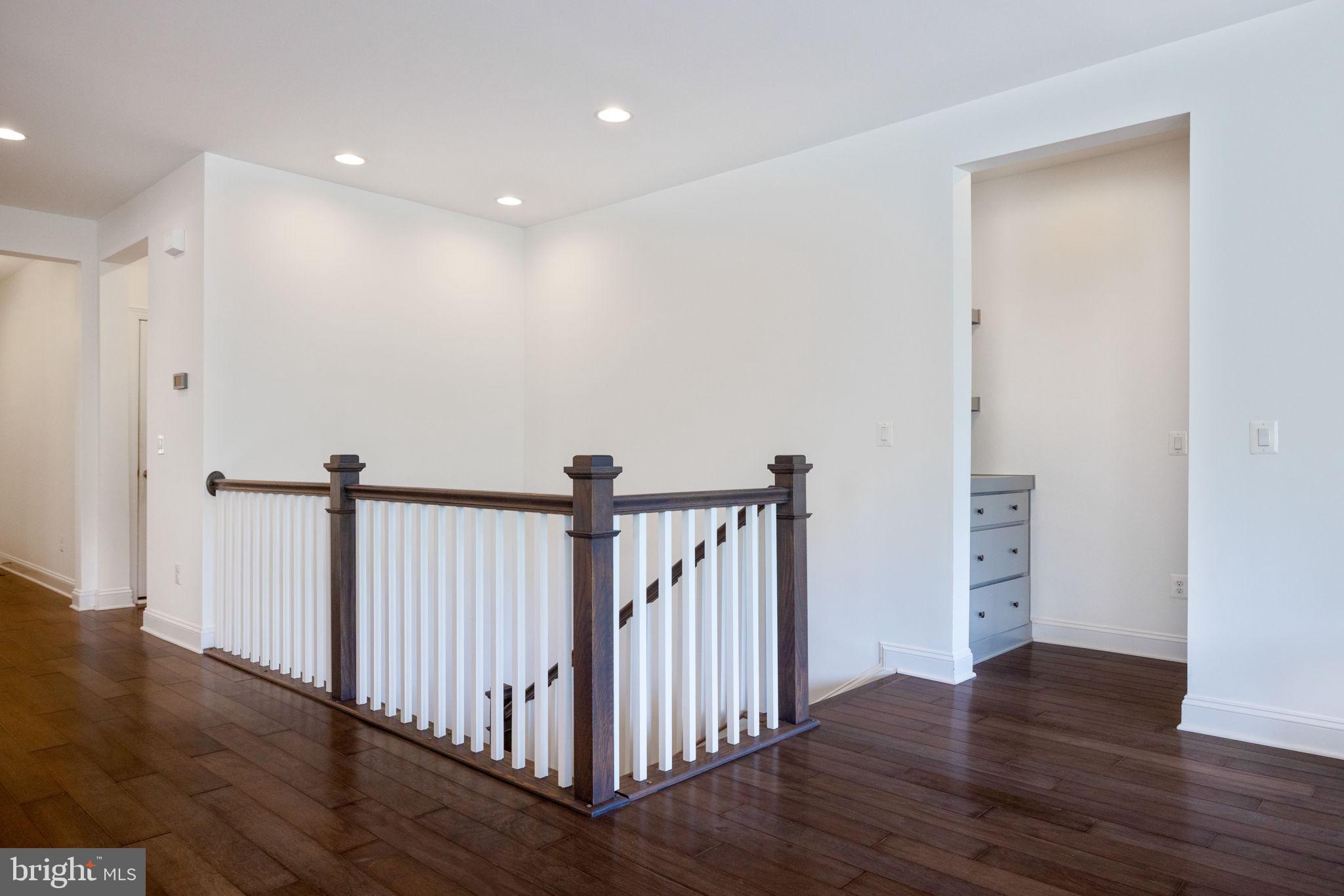 112 Flycatcher Way White Post, VA 22663 - Photo 31 of 59 a view of a hallway with wooden floor