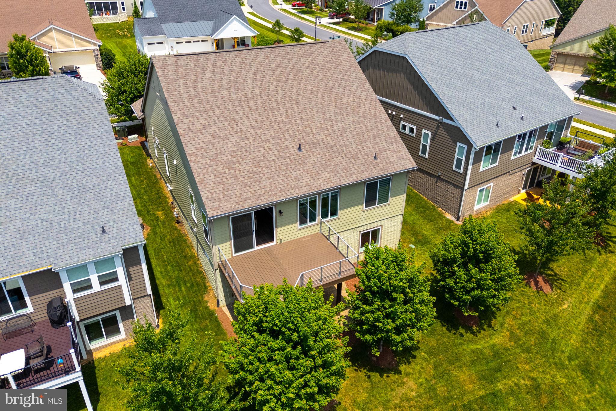 112 Flycatcher Way White Post, VA 22663 - Photo 45 of 59 an aerial view of a house with a yard and garage