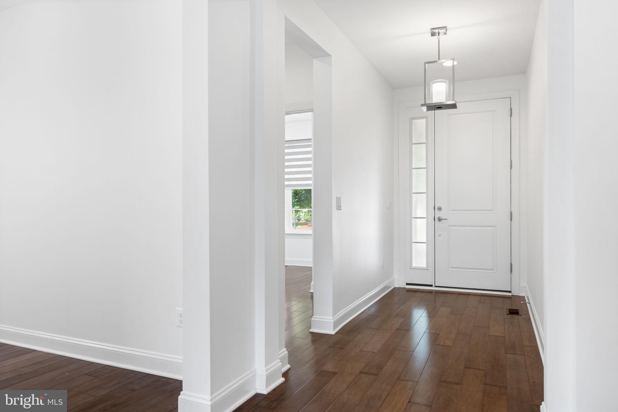 112 Flycatcher Way White Post, VA 22663 - Photo 5 of 59 an empty room with wooden floor sink and closet