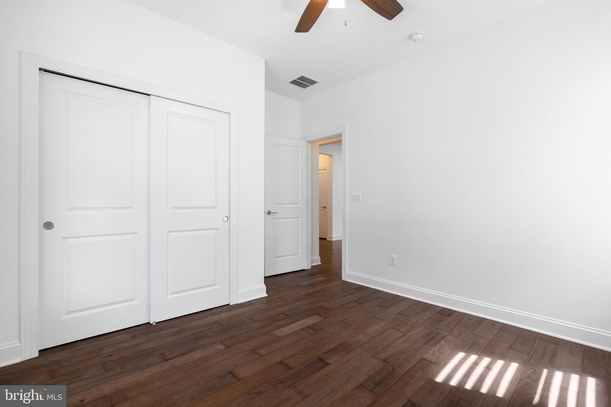 112 Flycatcher Way White Post, VA 22663 - Photo 7 of 59 an empty room with wooden floor
