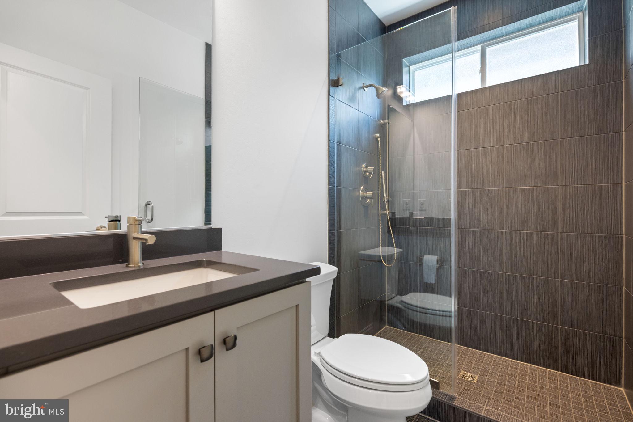 112 Flycatcher Way White Post, VA 22663 - Photo 8 of 59 a bathroom with a sink toilet and shower