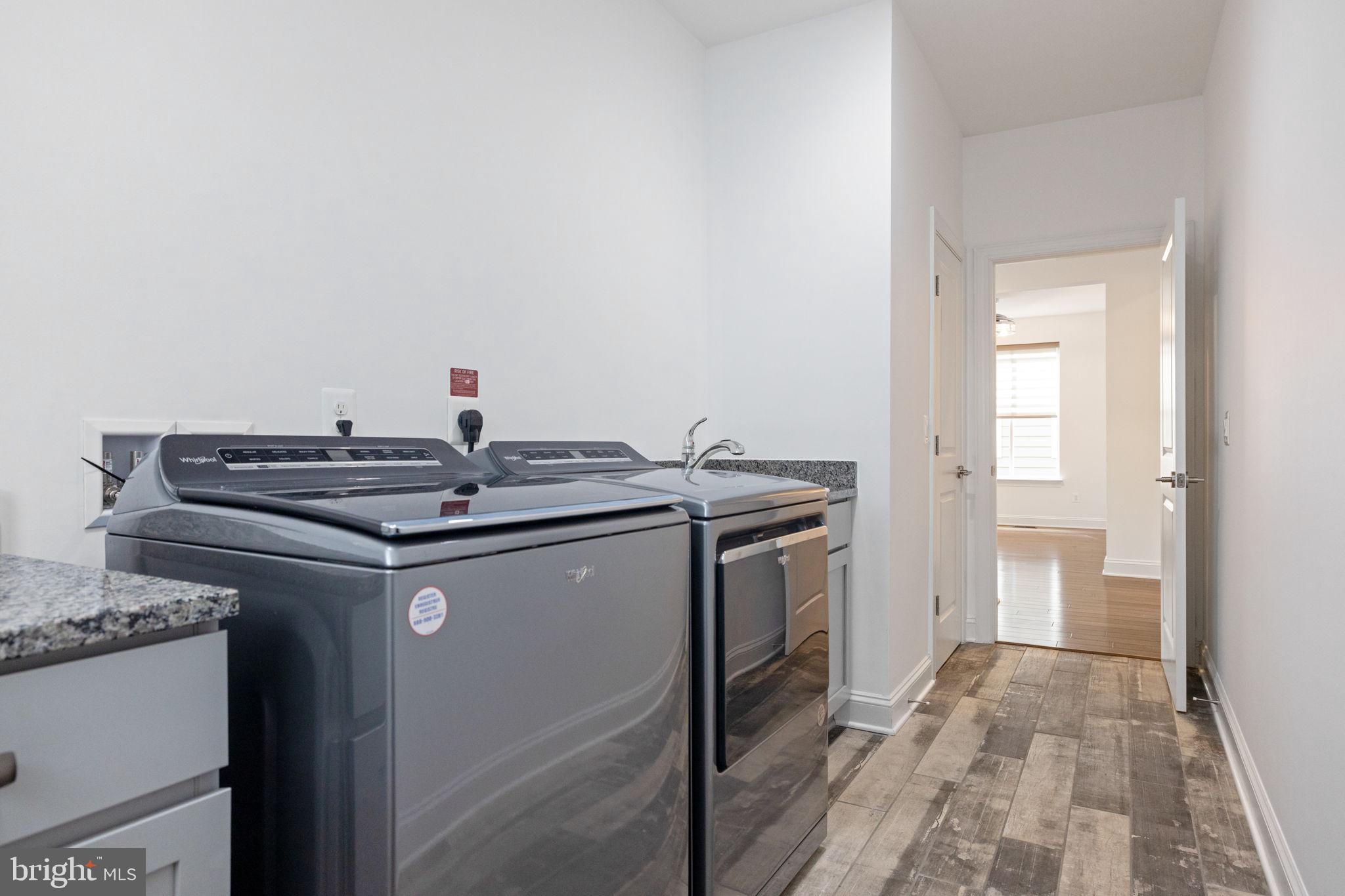 112 Flycatcher Way White Post, VA 22663 - Photo 10 of 59 a utility room with washer and dryer