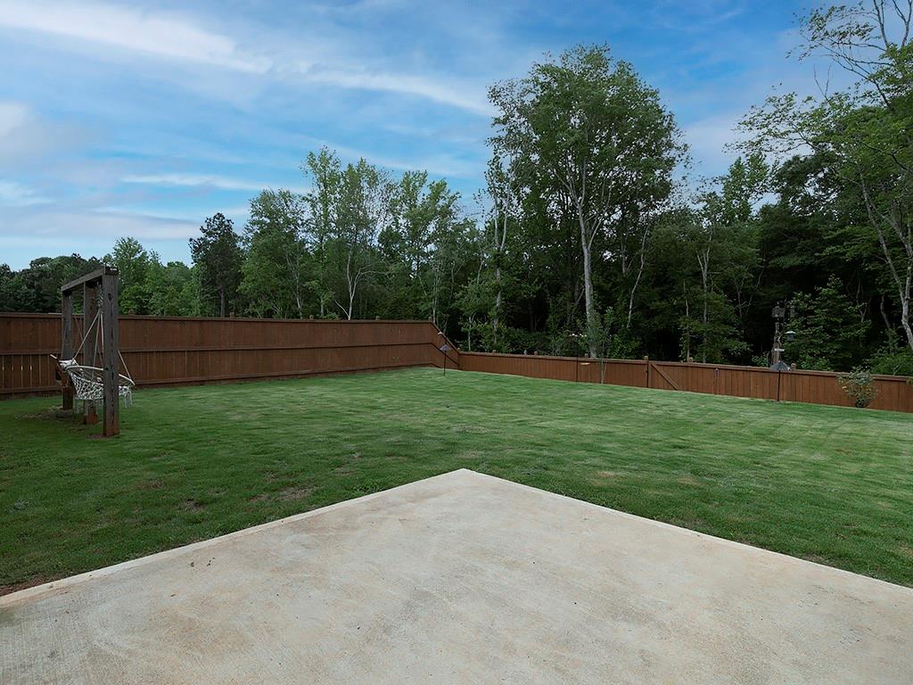 371 Highgrove Circle Dallas, GA 30157 - Photo 19 of 20 a view of outdoor space with deck and yard