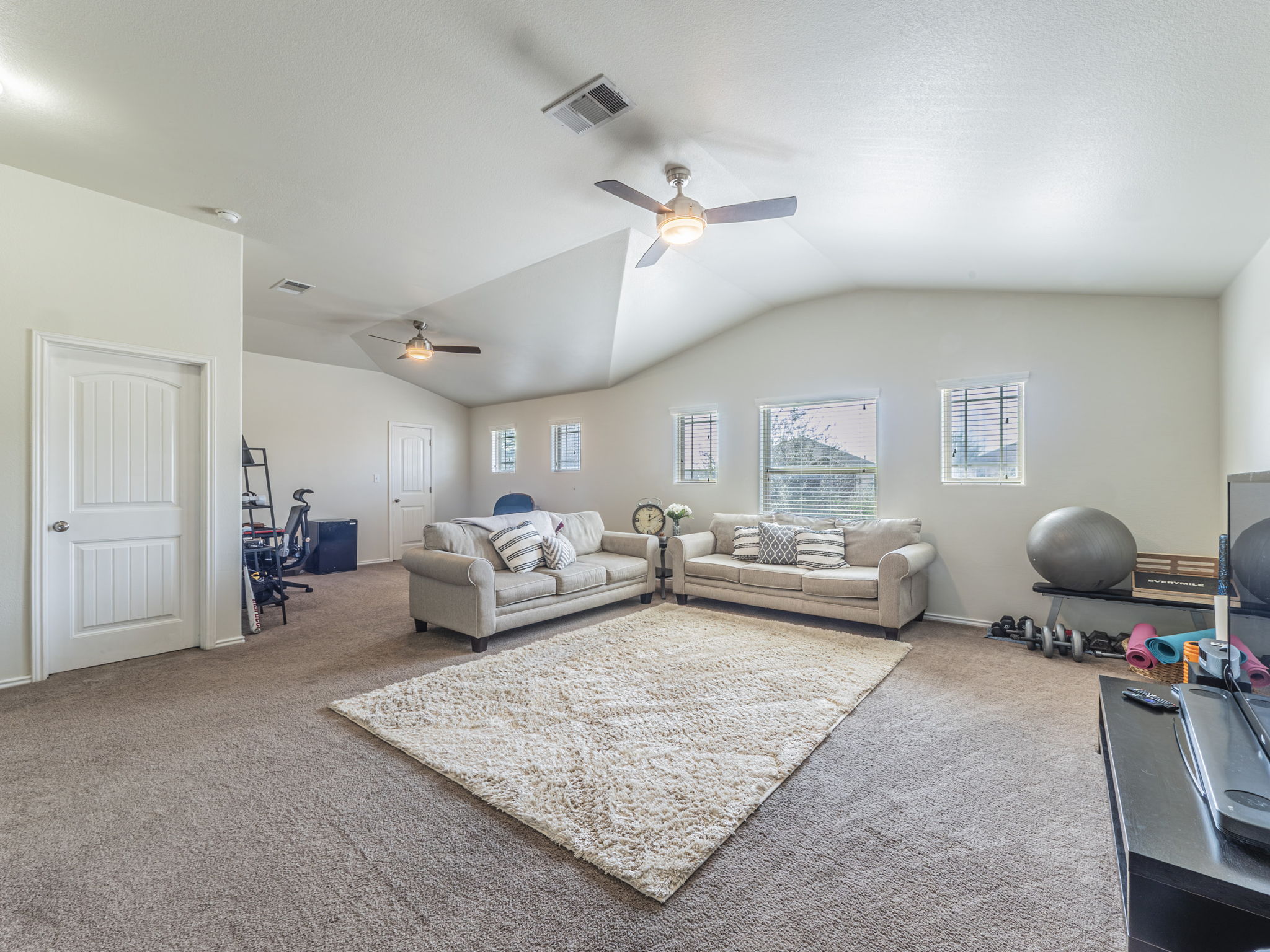 1366 Heep Run Buda, TX 78610 - Photo 15 of 37 Upstairs living area featuring abundant space.