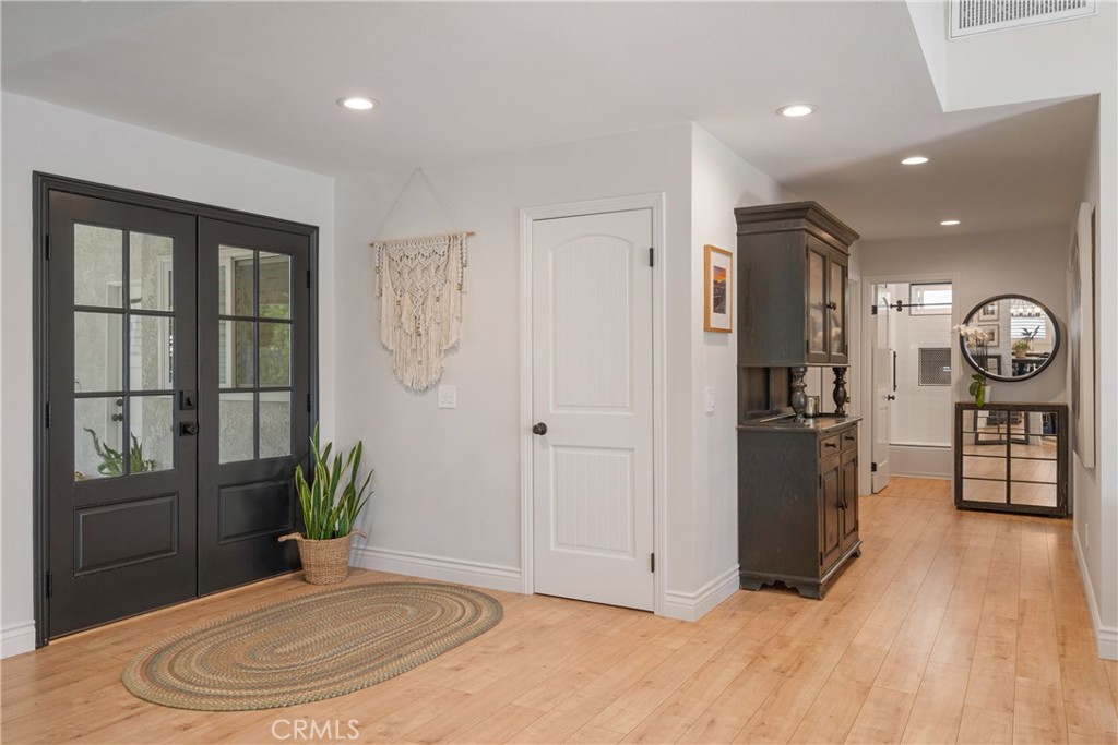 13822 Henstridge Circle Tustin, CA 92780 - Photo 18 of 61 a view of a livingroom with furniture and hardwood floor