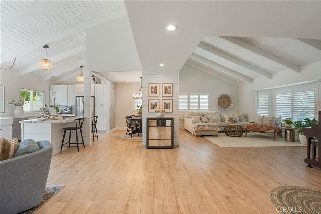 13822 Henstridge Circle Tustin, CA 92780 - Photo 26 of 61 a living room with furniture and wooden floor