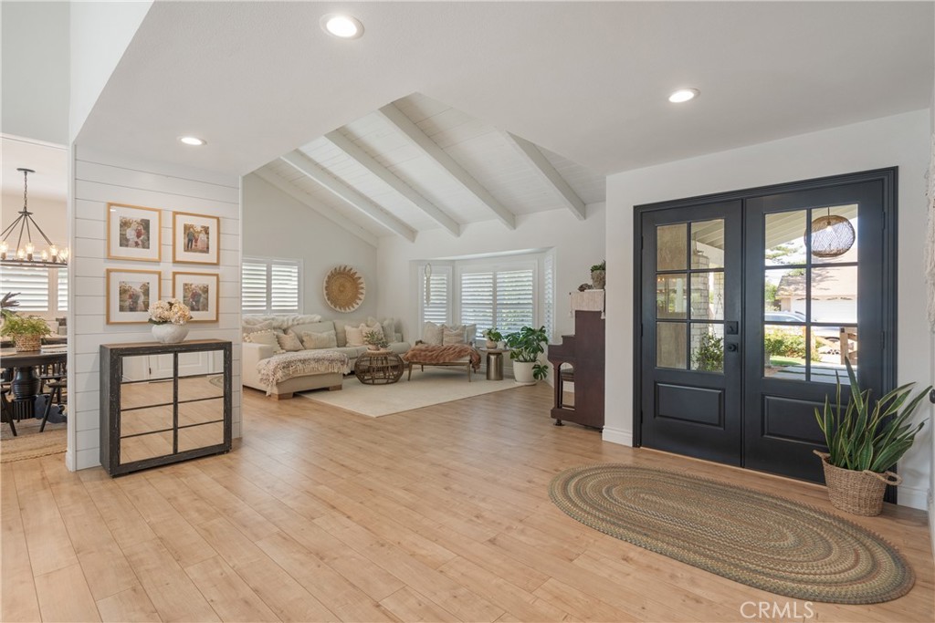 13822 Henstridge Circle Tustin, CA 92780 - Photo 27 of 61 a living room with furniture and a large window