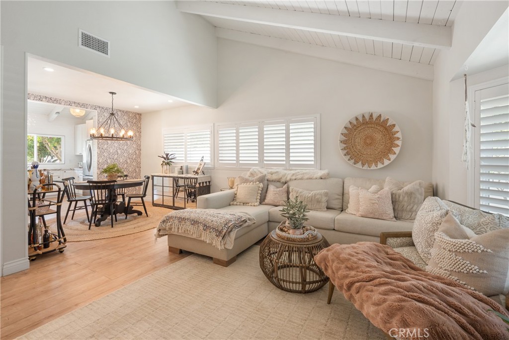 13822 Henstridge Circle Tustin, CA 92780 - Photo 30 of 61 a living room with furniture and a large window