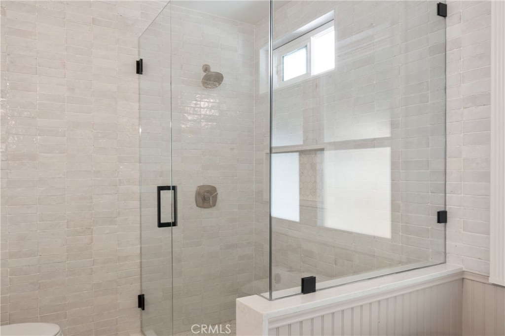 13822 Henstridge Circle Tustin, CA 92780 - Photo 40 of 61 a bathroom with a shower