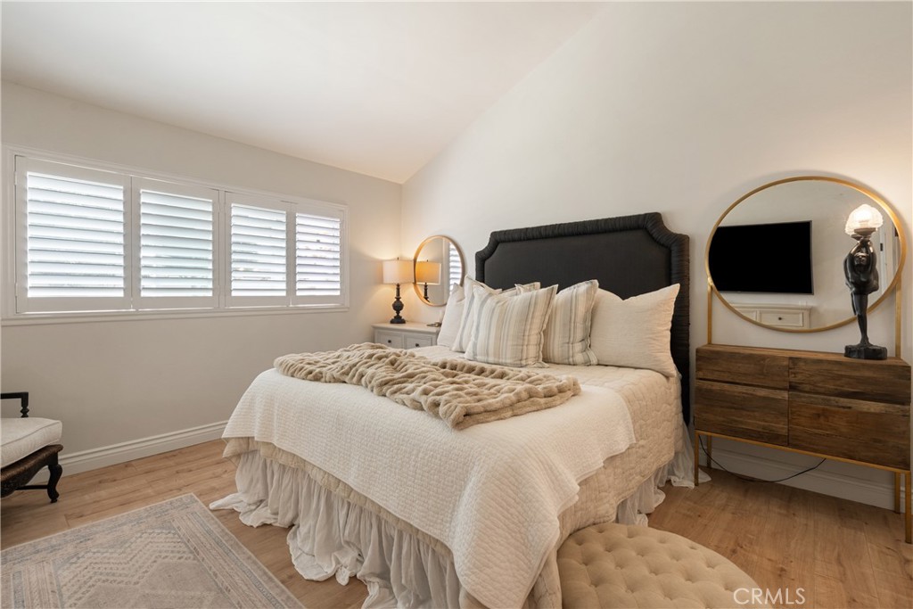 13822 Henstridge Circle Tustin, CA 92780 - Photo 46 of 61 a bedroom with a bed and a dresser