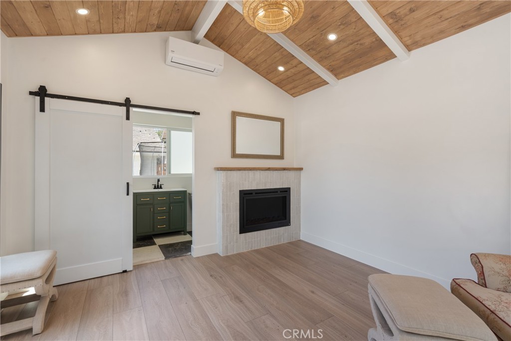 13822 Henstridge Circle Tustin, CA 92780 - Photo 53 of 61 a view of a livingroom with furniture and a fireplace