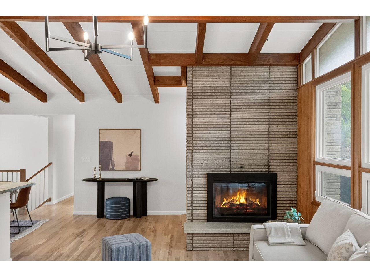 1118 Ridgelawn Drive Fort Collins, CO 80521 - Photo 6 of 48 The main floor Living Room is anchored by the original exposed aggregate brick fireplace
